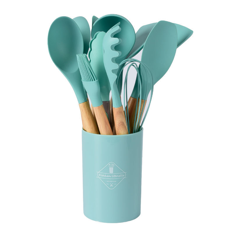 Juego de 12 utensilios de cocina con mangos de madera ChickShop Chile.